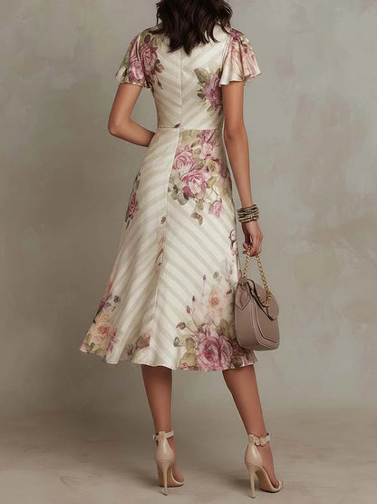 Andrea | Vestido midi satinado con estampado floral, elegante y sofisticado