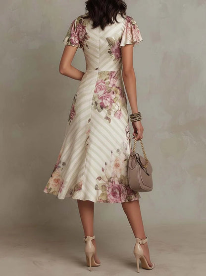 Andrea | Vestido midi satinado con estampado floral, elegante y sofisticado - Marina Durán